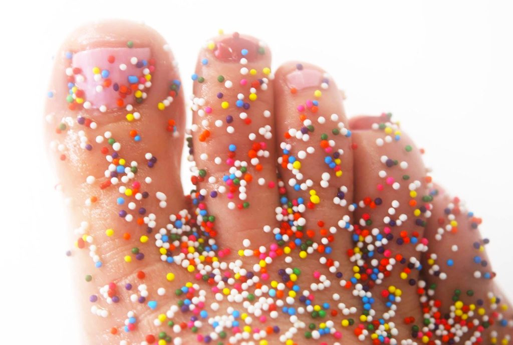 Spinkles on a foot. Closeup